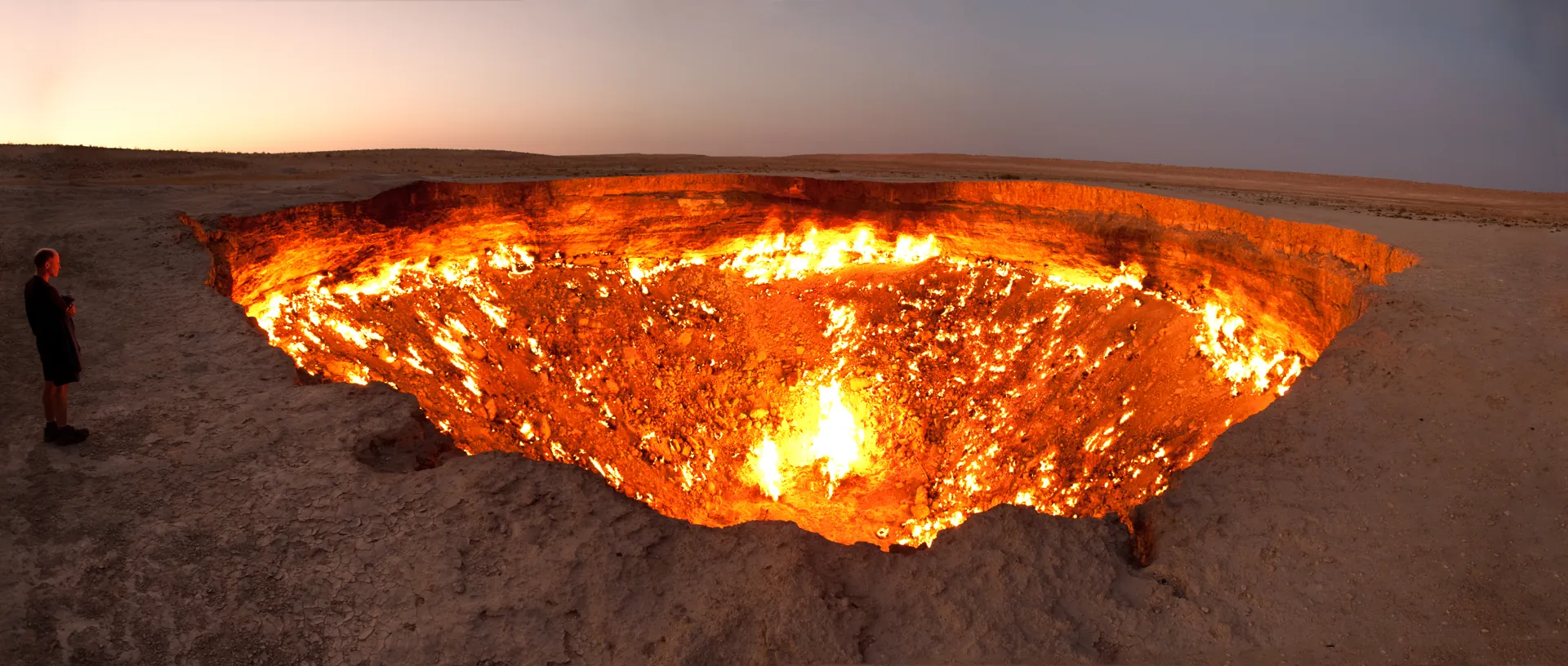 The Darvaza gas crater glowing at dusk