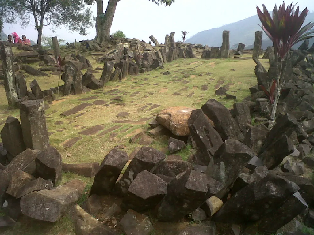 Upright and fallen stone columns on the terraces.