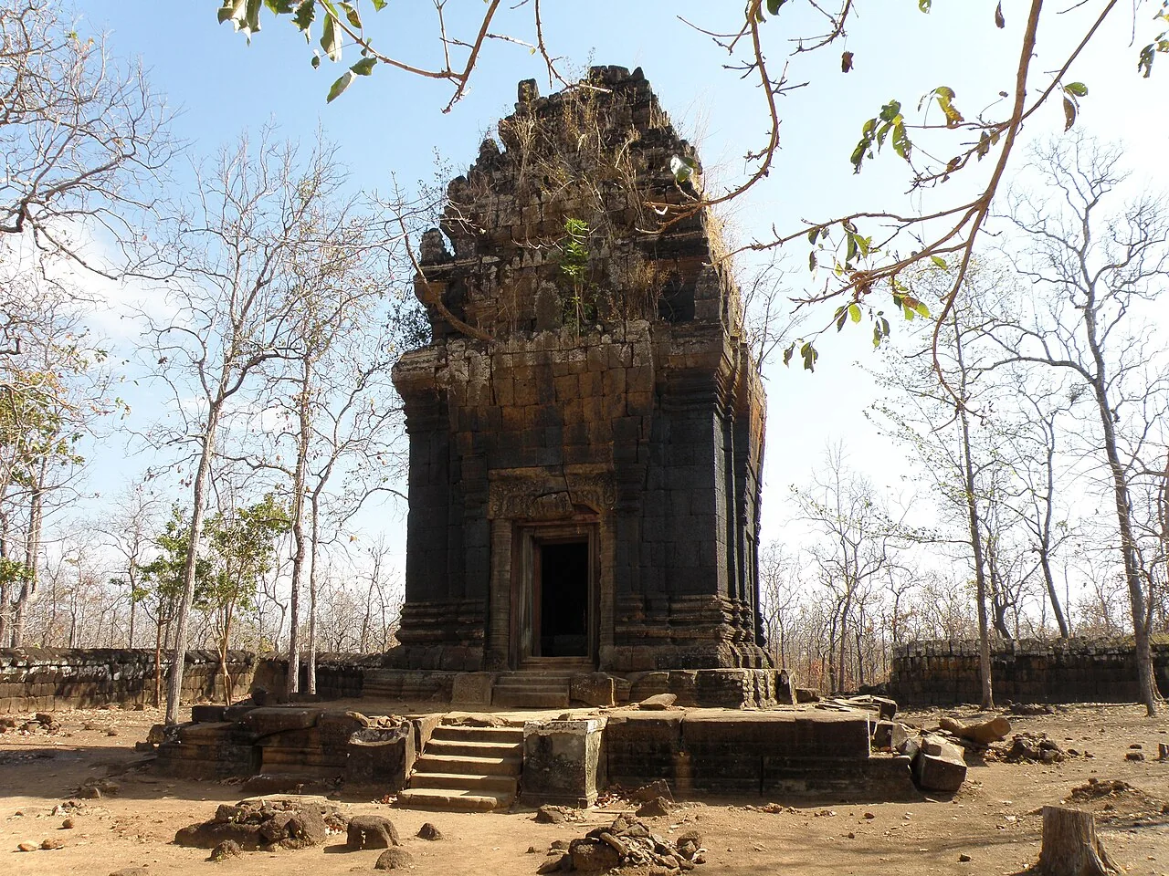 A standing temple tower at Koh Ker surrounded by trees