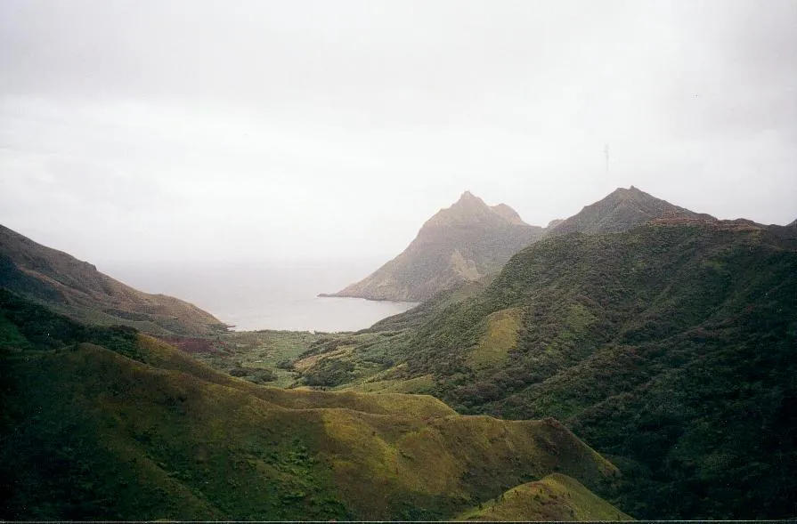 Green mountains above the coast at Hiri Bay on Rapa Iti