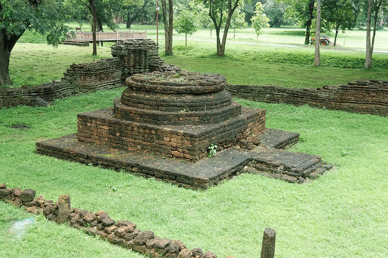 Stone and brick remains of a circular base at Wat Nang Phaya
