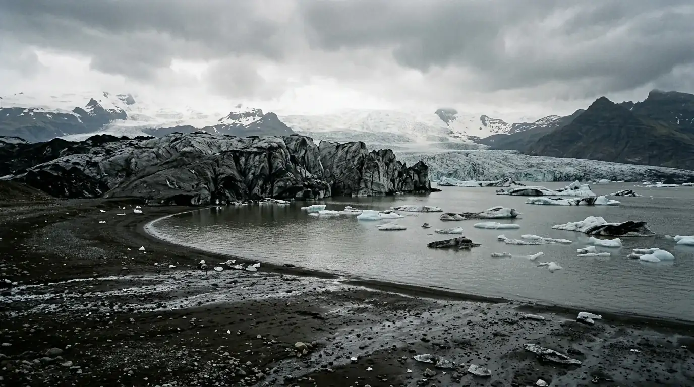 Interpretive AI-created illustration of an ash-streaked glacier snout meeting a grey meltwater lagoon over black sand