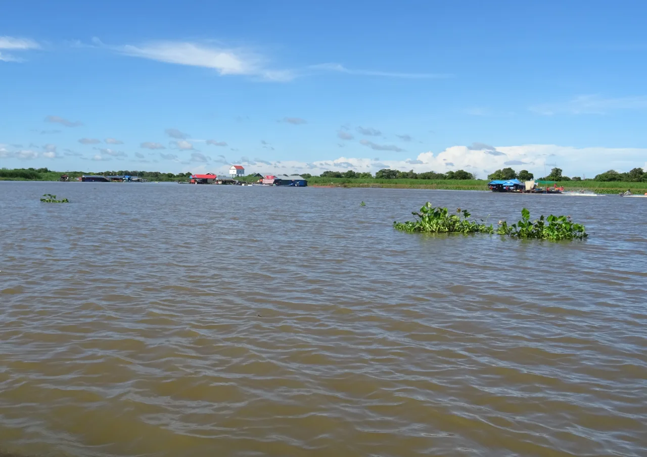 Floating buildings on Tonlé Sap seen during a boat journey
